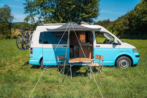 Side view of VW T5 Campervan with hard roof top from Balkan Campers in Ljubljana, Slovenia