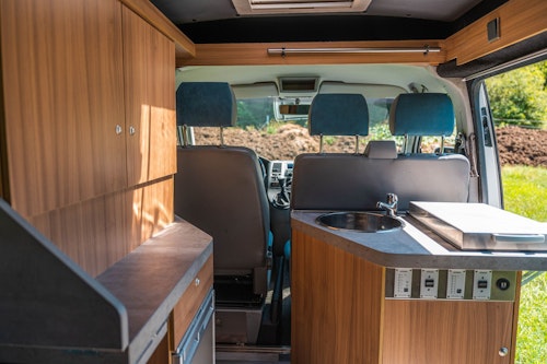 Kitchen box in VW T5 Campervan with hard roof top from Balkan Campers in Ljubljana, Slovenia
