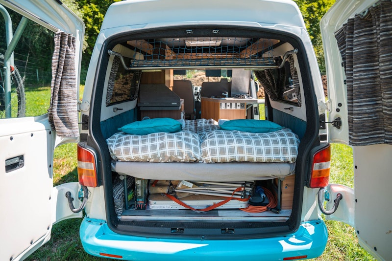 Back view of VW T5 Campervan with hard roof top from Balkan Campers in Ljubljana, Slovenia