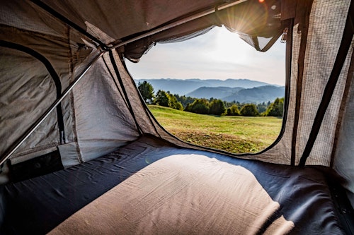 Roof tent view in VW T4 Campervan with roof tent from Balkan Campers in Tolmin, Slovenia
