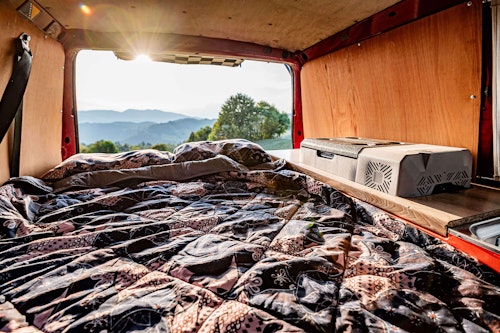 Lower bedroom in VW T4 Campervan with roof tent from Balkan Campers in Tolmin, Slovenia