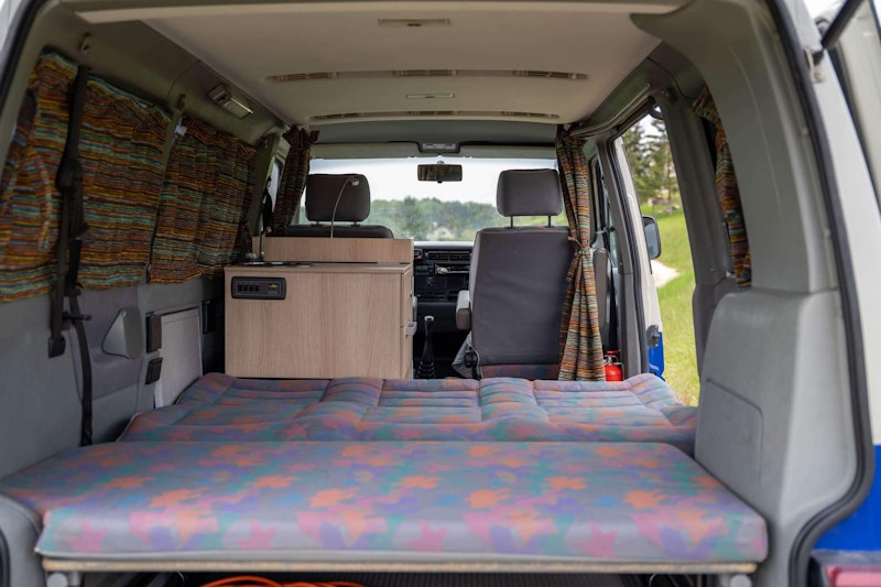 Bedroom inside of VW T4 campervan From Balkan Campers in Ljubljana, Slovenia