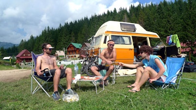 Primoz, Rožle and Mitja hanging in the camp on the Black Lake in Žabljak, Montenegro
