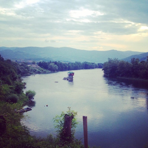 Drina river with small house on a small rocky island