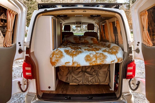 Bedroom in VW T6 automatic Campervan from Balkan Campers at Lake Bohinj, Slovenia