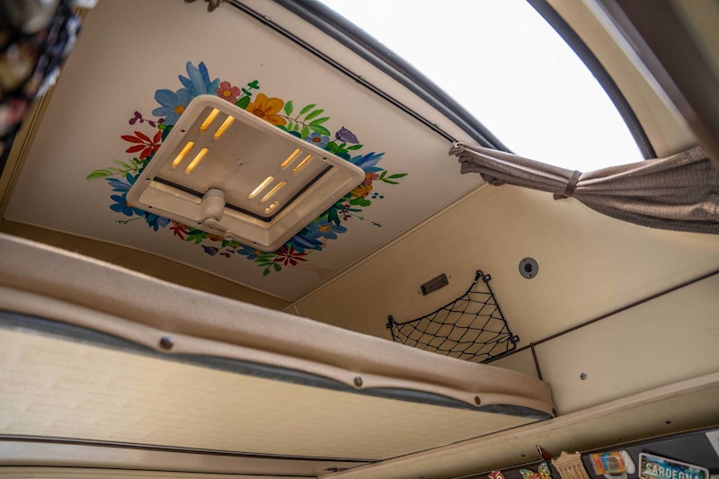 Roof window and upstairs area of VW T3 Campervan Original Westfalia with hard roof top from Balkan Campers in Ljubljana, Slovenia