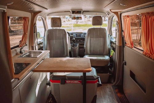 Living space in VW T6 automatic Campervan from Balkan Campers at Lake Bohinj, Slovenia