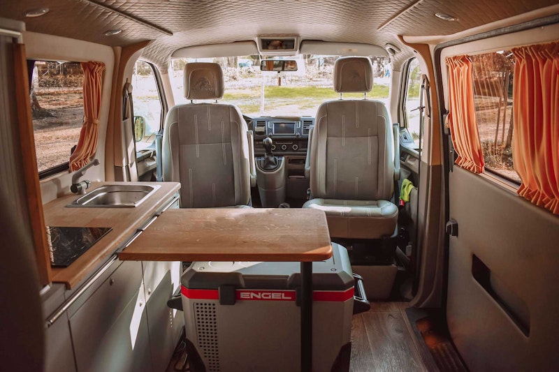 Living space in VW T6 automatic Campervan from Balkan Campers at Lake Bohinj, Slovenia
