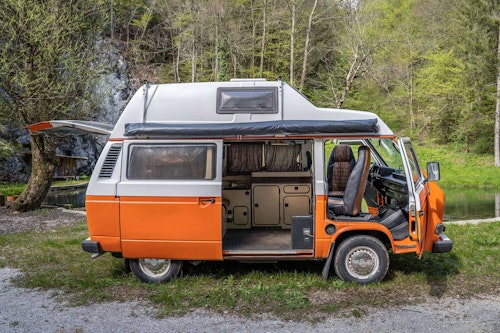 Side View of VW T3 Campervan Original Westfalia with hard roof top from Balkan Campers in Ljubljana, Slovenia