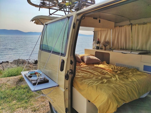 Cosy bed in VW T4 Camper van from Balkan Campers in Labin, Croatia