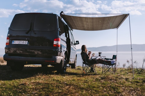 VW T5 Campervan from Balkan Campers parked next to the Adriatic ocean in Opatija, Croatia
