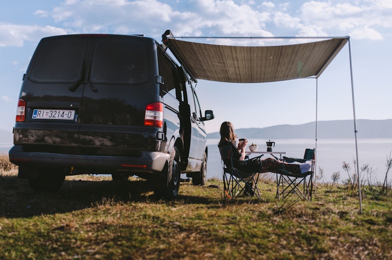 VW T5 Campervan from Balkan Campers parked next to the Adriatic ocean in Opatija, Croatia