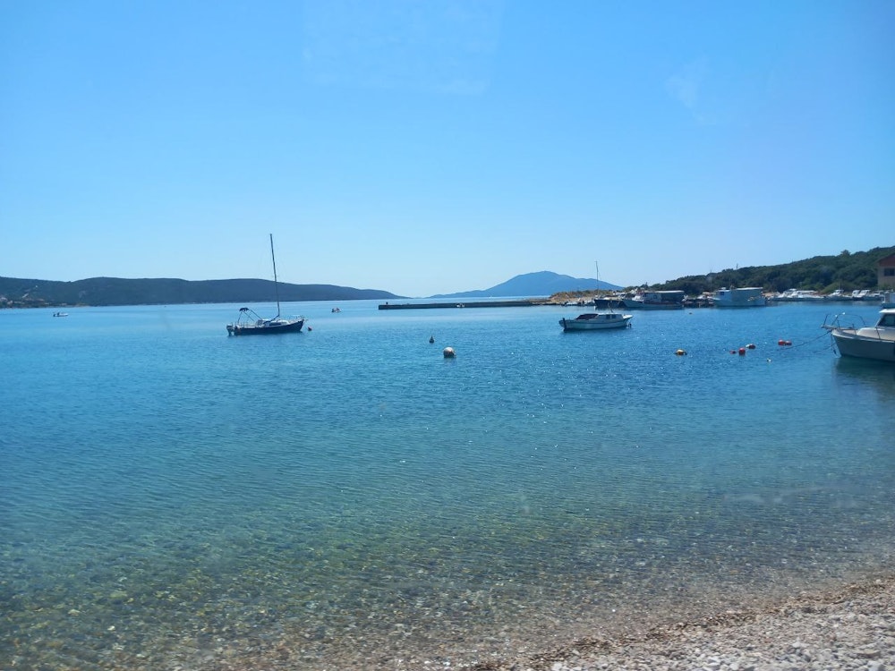 Balkan Campers customers on a beach in Martinščica, Cres, Croatia