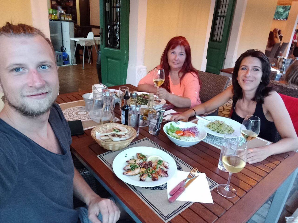 Balkan Campers customers eating seafood in a restaurant on Cres Island, Croatia