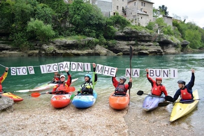 Group of activists demonstrating against dam building on Balkan Rivers