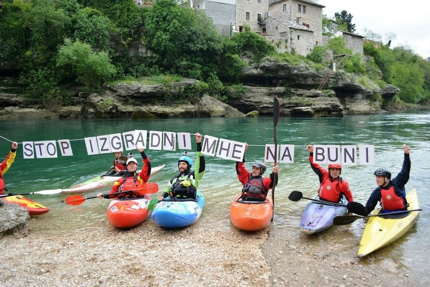 Group of activists demonstrating against dam building on Balkan Rivers