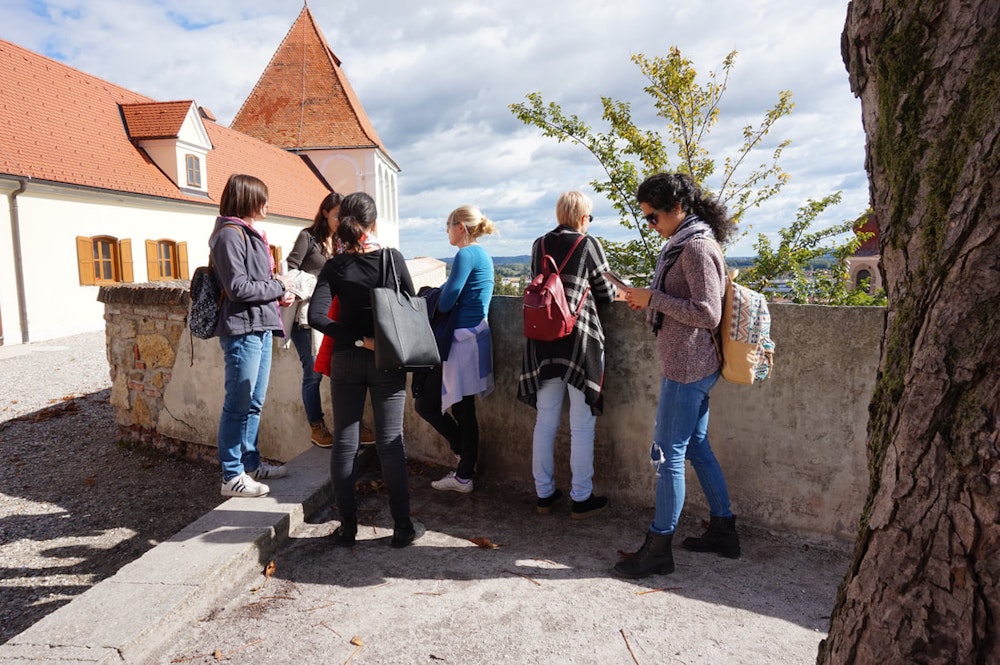 Balkan Campers customers hiking to Ptuj Castle, Slovenia