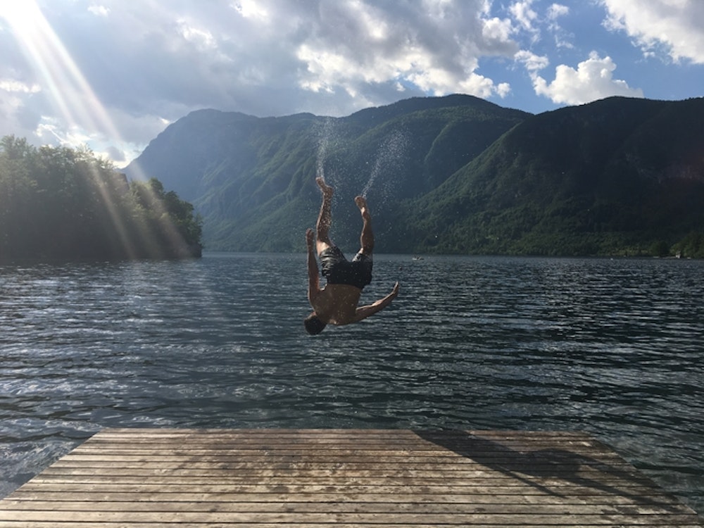 Balkan Campers customers swimming in Lake Bohinj, Slovenia