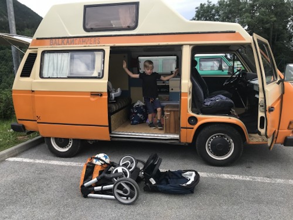 Small kid in VW T3 campervan from Balkan Campers