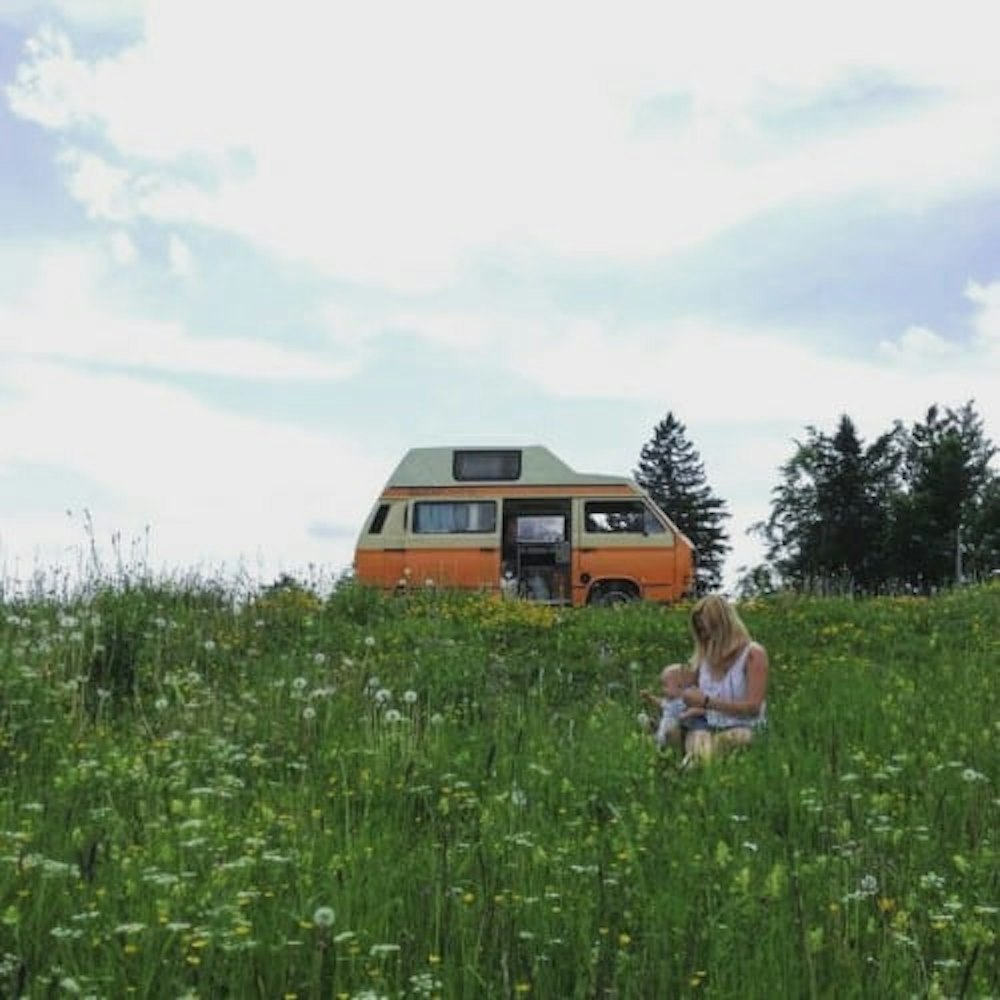 Mother and child with VW T3 bus from Balkan Campers
