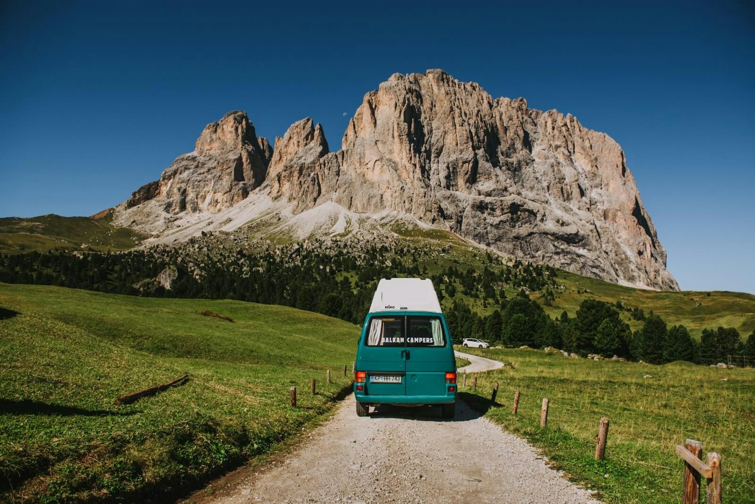 Green VW T4 campervan in Dolomites