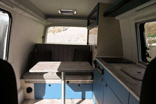 Inside table and kitchen box in VW Campervan