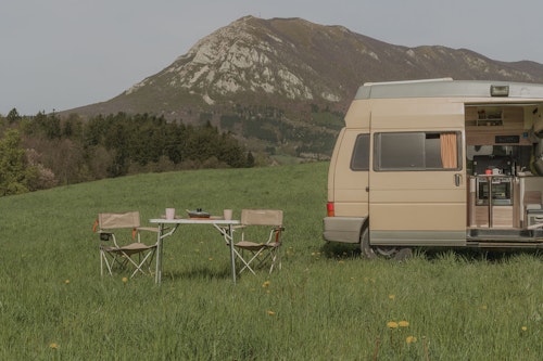 Camping chairs infront of VW T4 Campervan in Slovenia