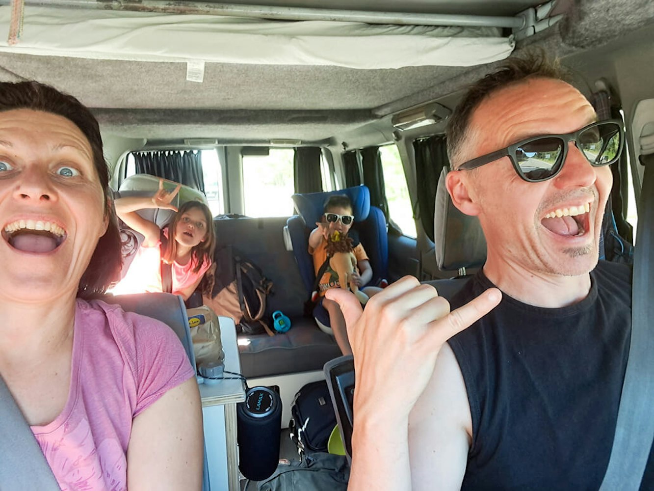 Happy family in VW campervan from Balkan Campers