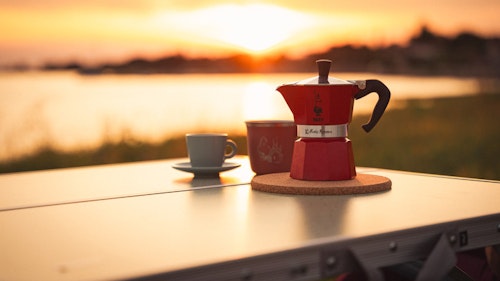 Enjoying coffee in VW Campervan from Balkan Campers