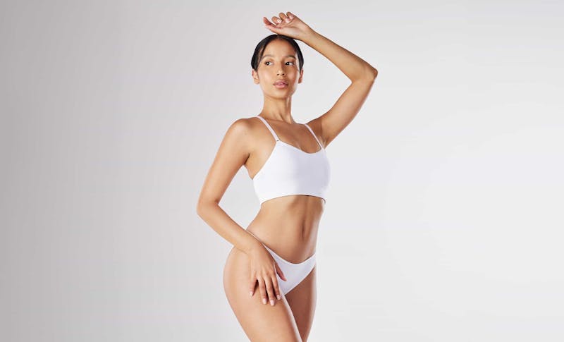 Woman posing in white underwear