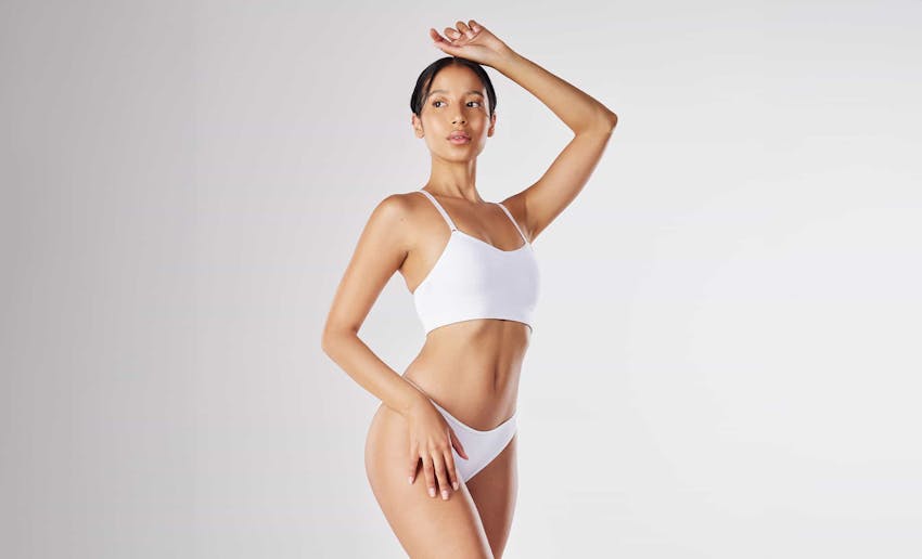 Woman posing in white underwear