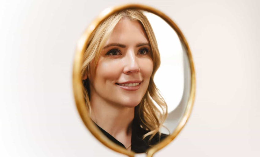 Womans face in the mirror