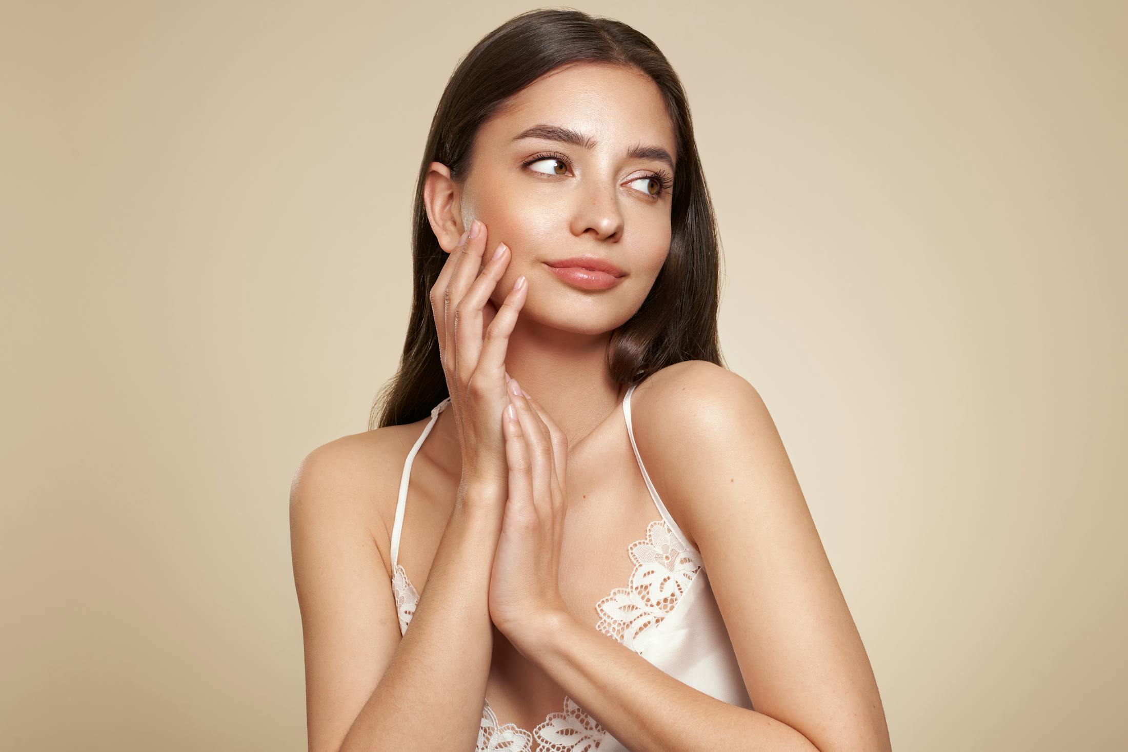 Woman touching her face