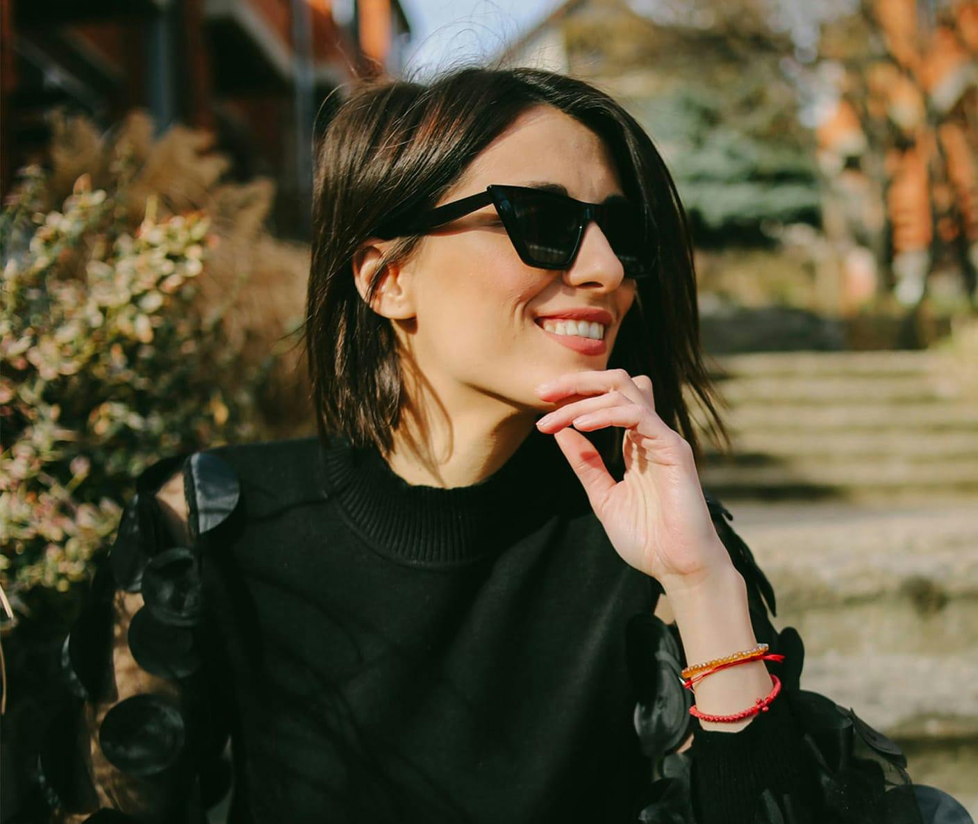woman wearing sunglasses outside