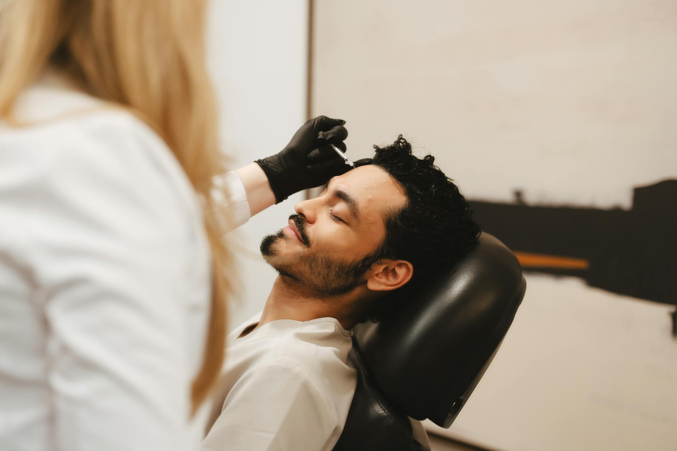 Emelio receiving an injection