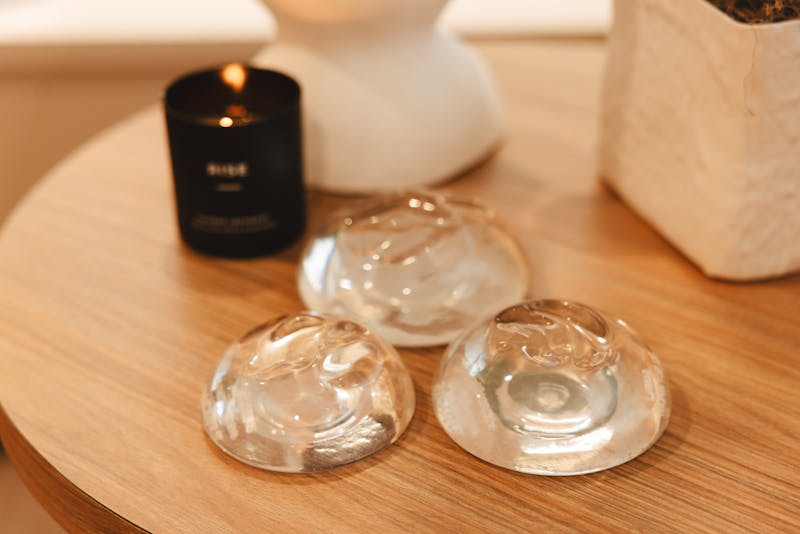 3 various sizes of breast implants