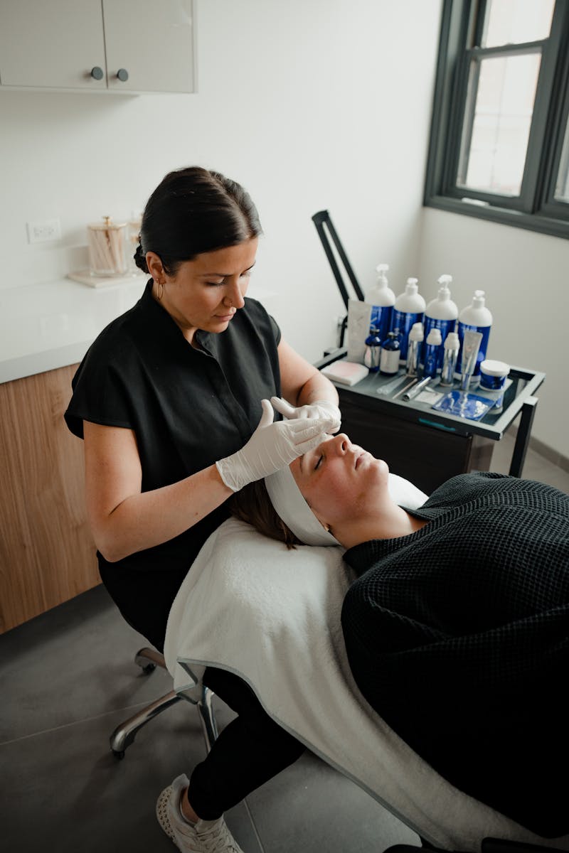 patient receiving facial treatment