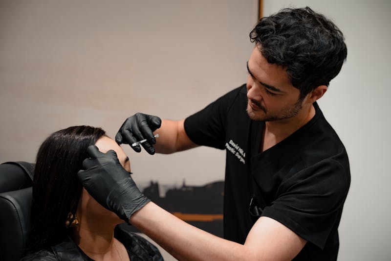 Dr. Hill administering botox injection