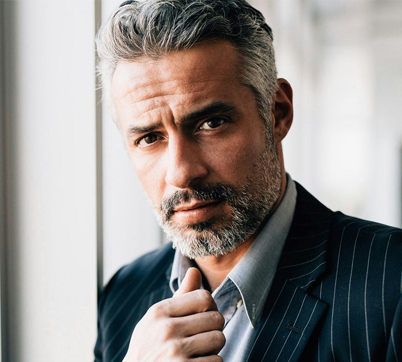 man in suit with salt and pepper hair