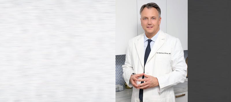 Dr. White in white suit