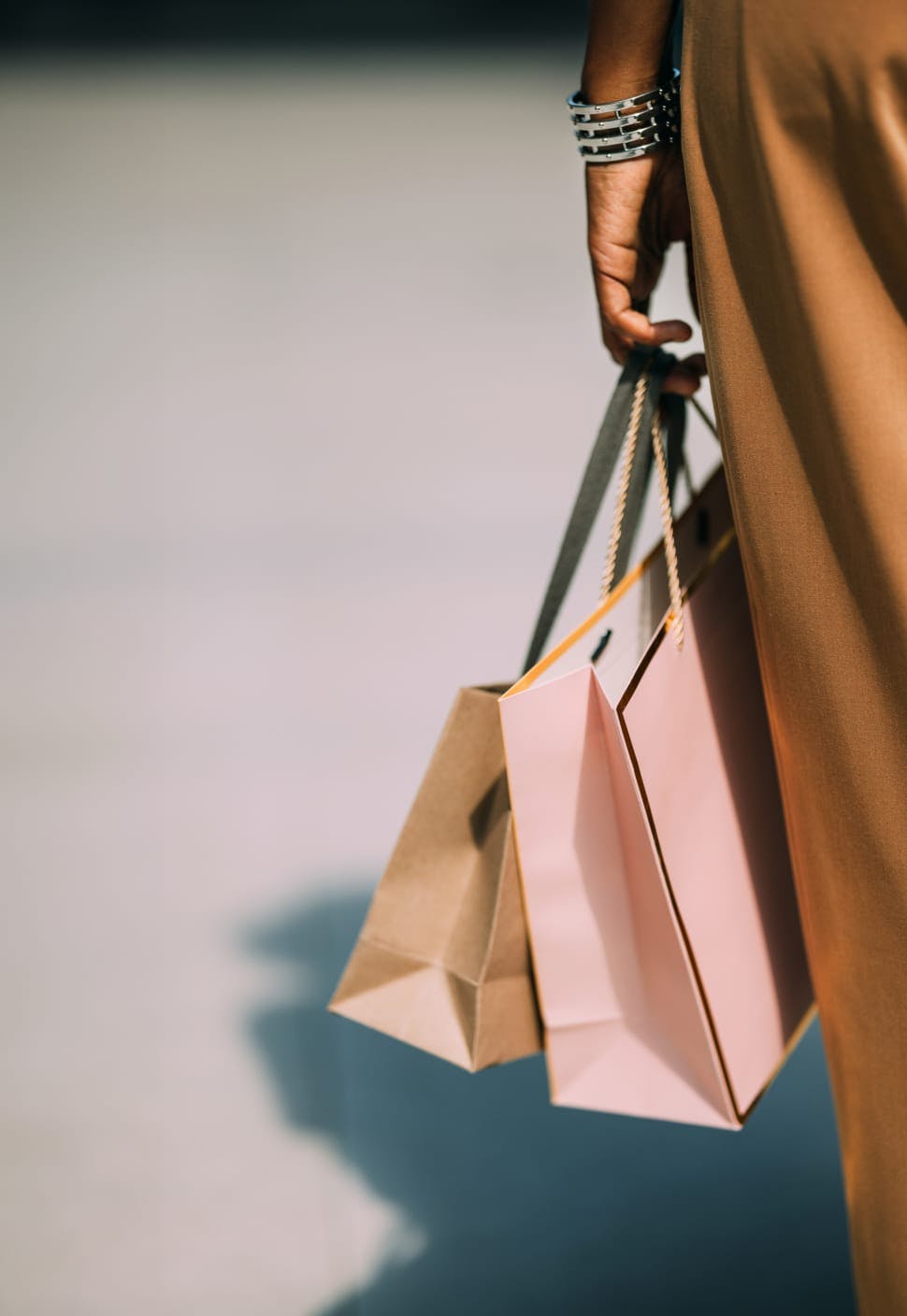 woman holding shopping bags