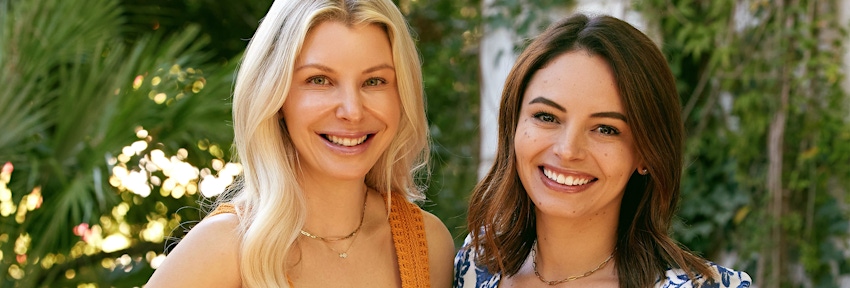 2 ladies smiling together