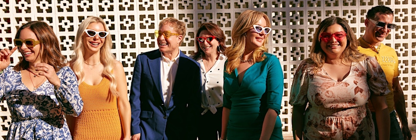 Korman team standing together