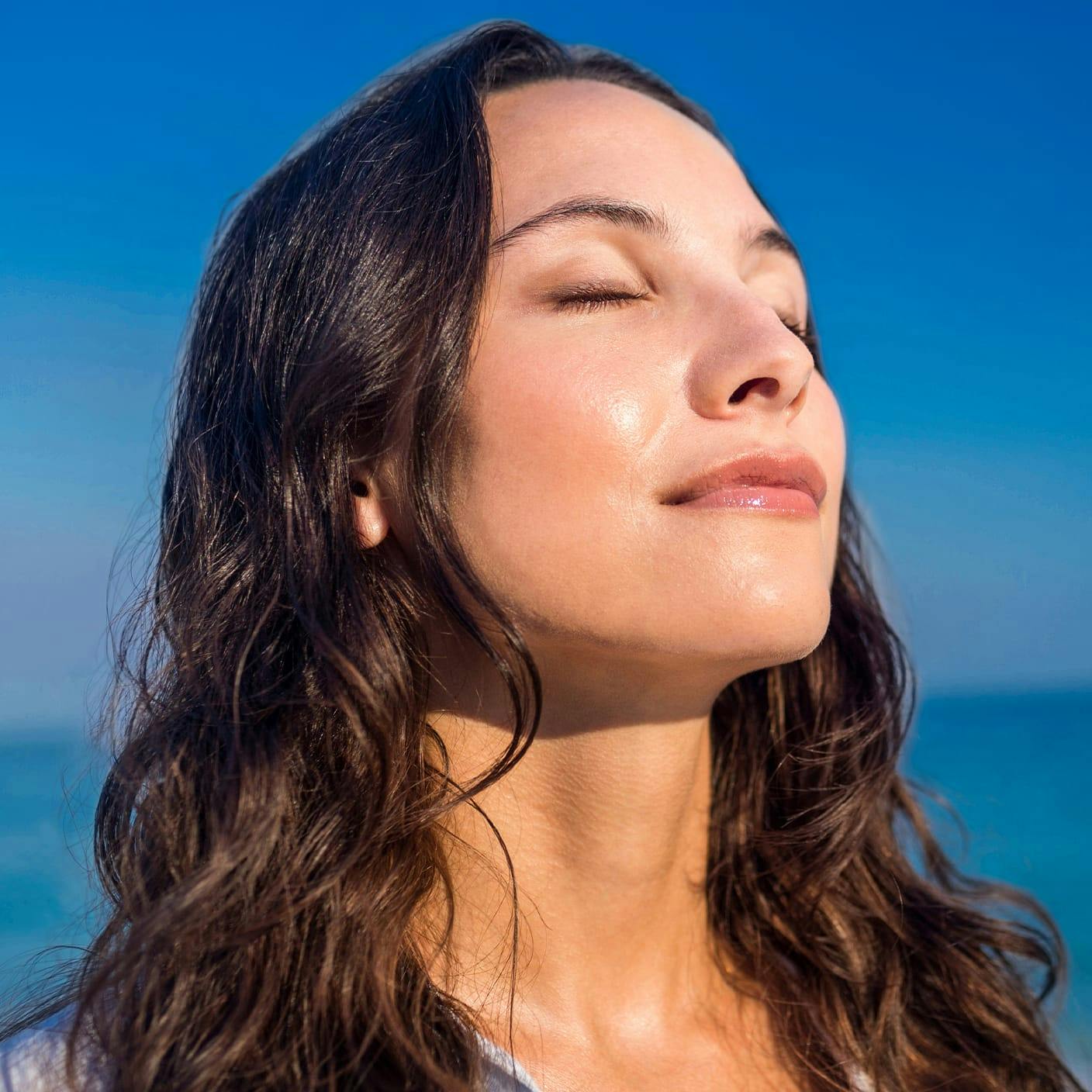 pretty woman with her eyes closed