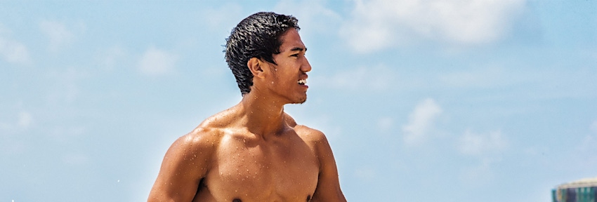woman in white bikini tanning in sun