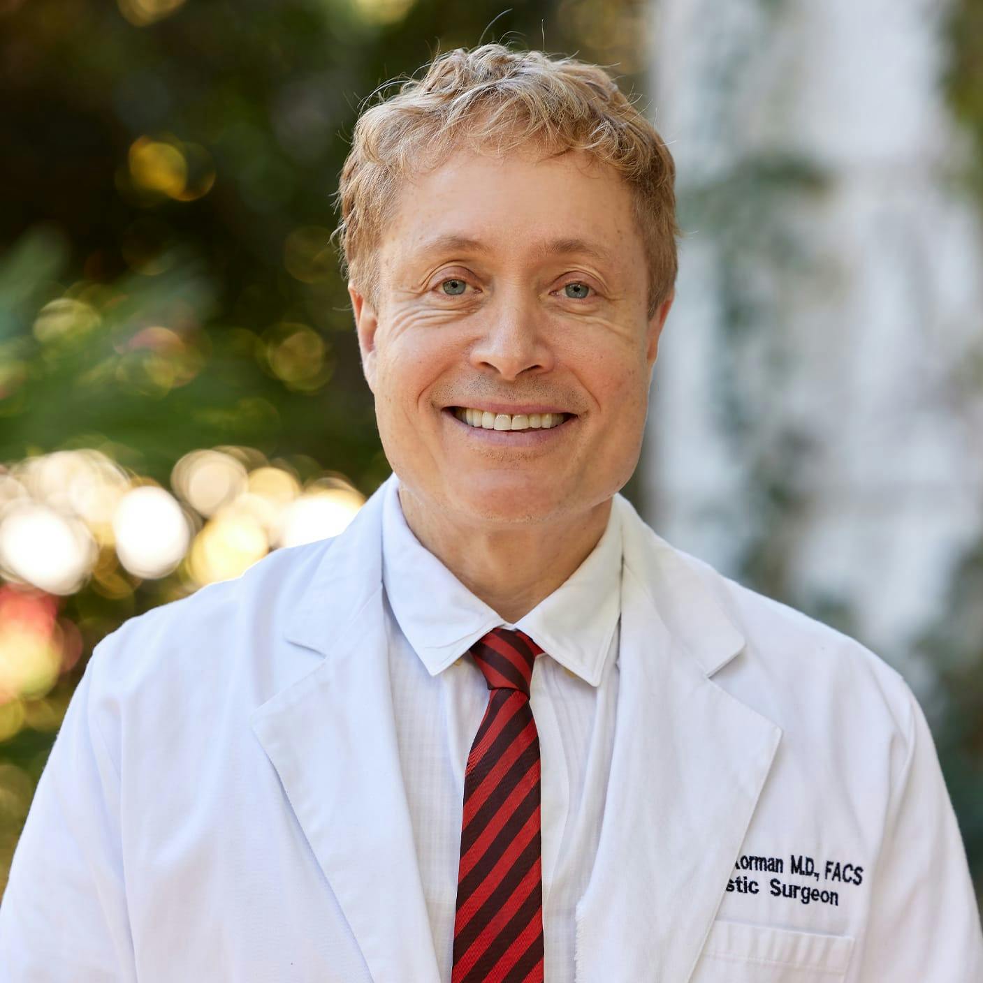 Dr. Korman smiling