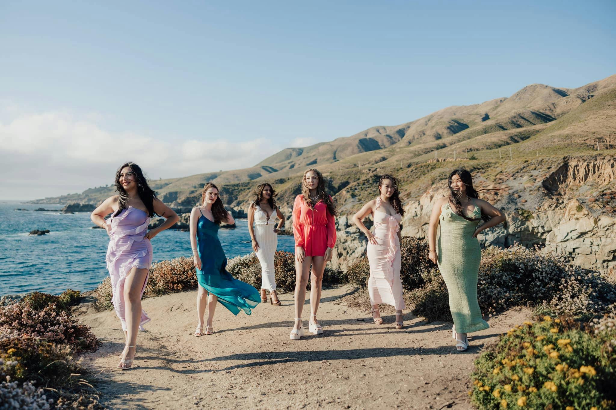 Women standing by the beach