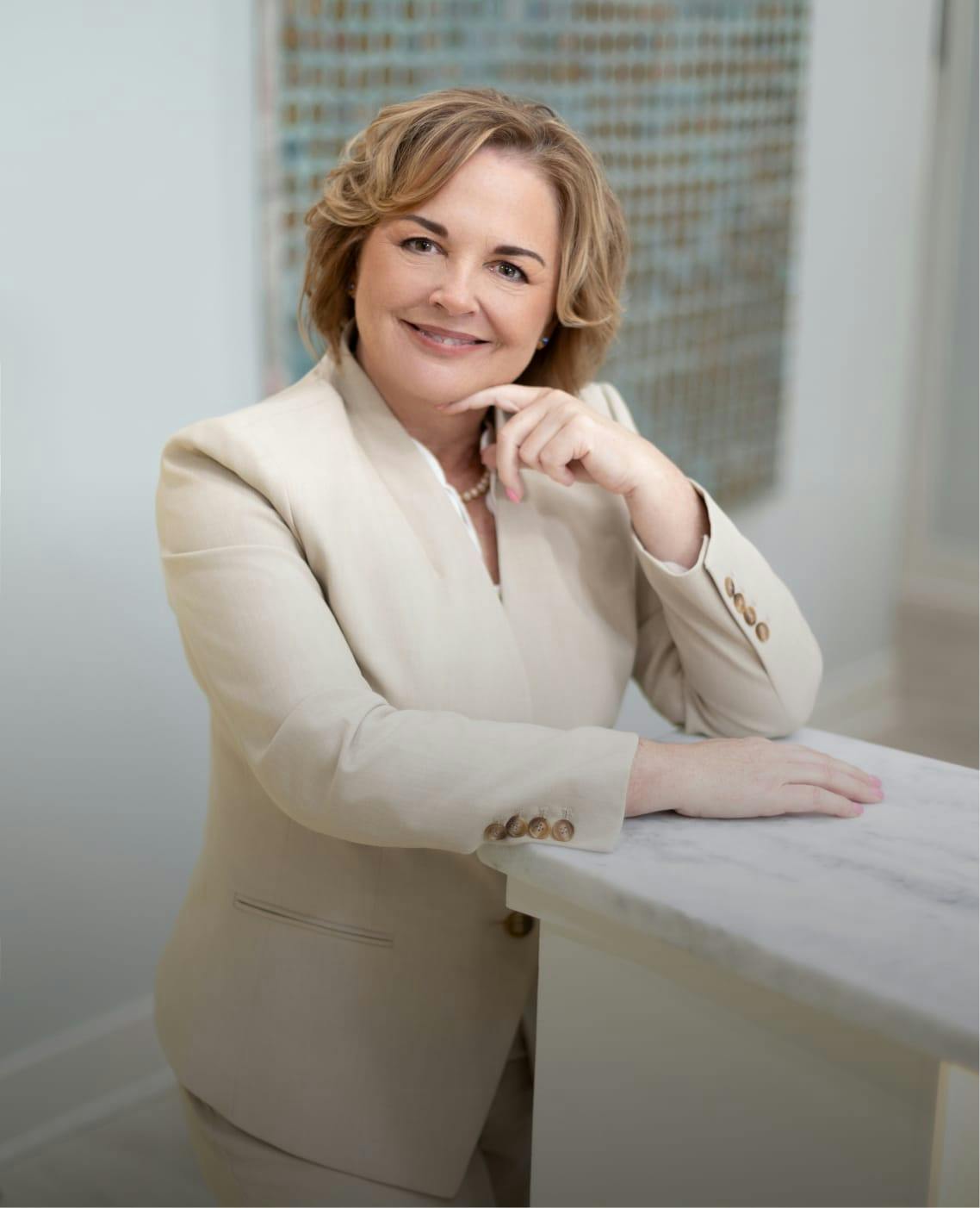 Woman in a tan jacket