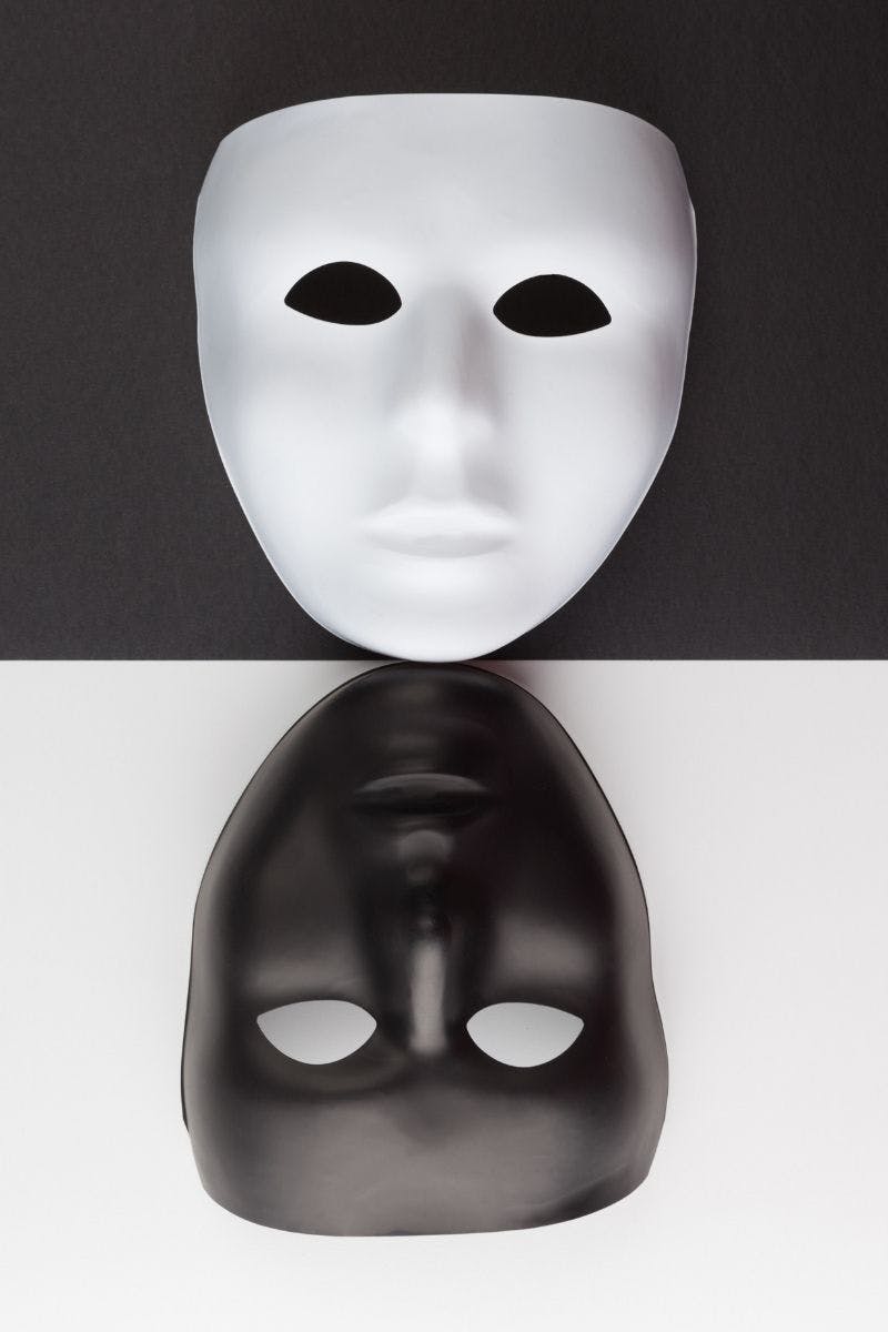 A white and black mask