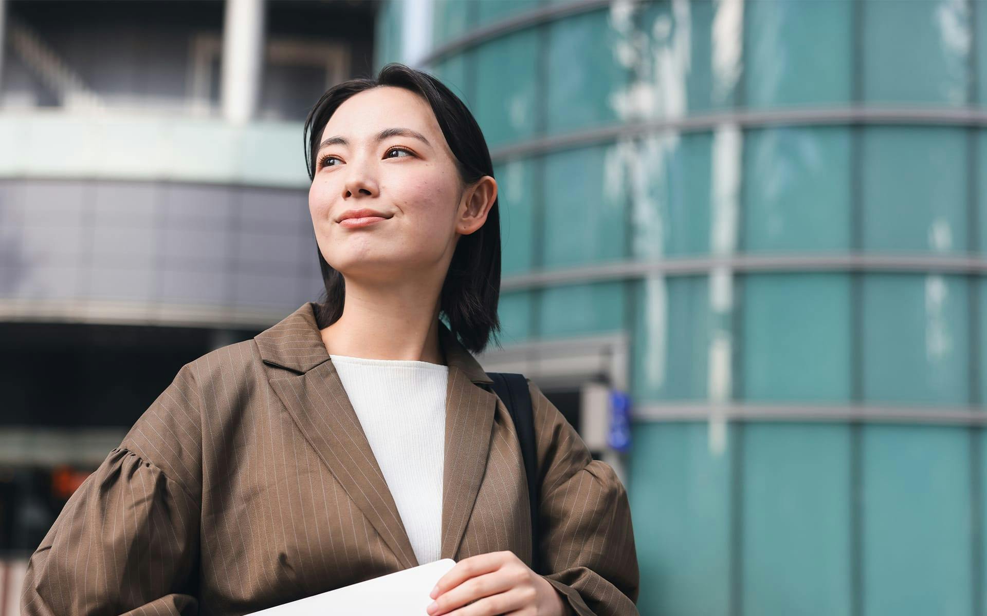 woman looking to the left in suit